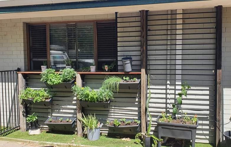 A couple of pool fence panels and old sleepers inspired this vertical herb garden. The ONE+ Angle Grinder cut the panels like butter to frame the kitchen window perfectly and the ONE+ Drill mounted the sleepers for the rustic feel. Almost all materials used were upcycled. The mint, parsley, basil, chives and thyme are loving it already and the passionfruit will fill the boring wall in no time.  