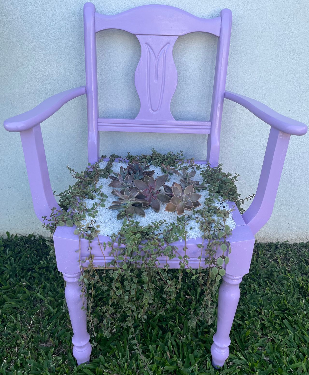 Repurposed garden chair. I used my Ryobi sander to prepare the chair, then used my Ryobi drill to tighten screws before painting. 