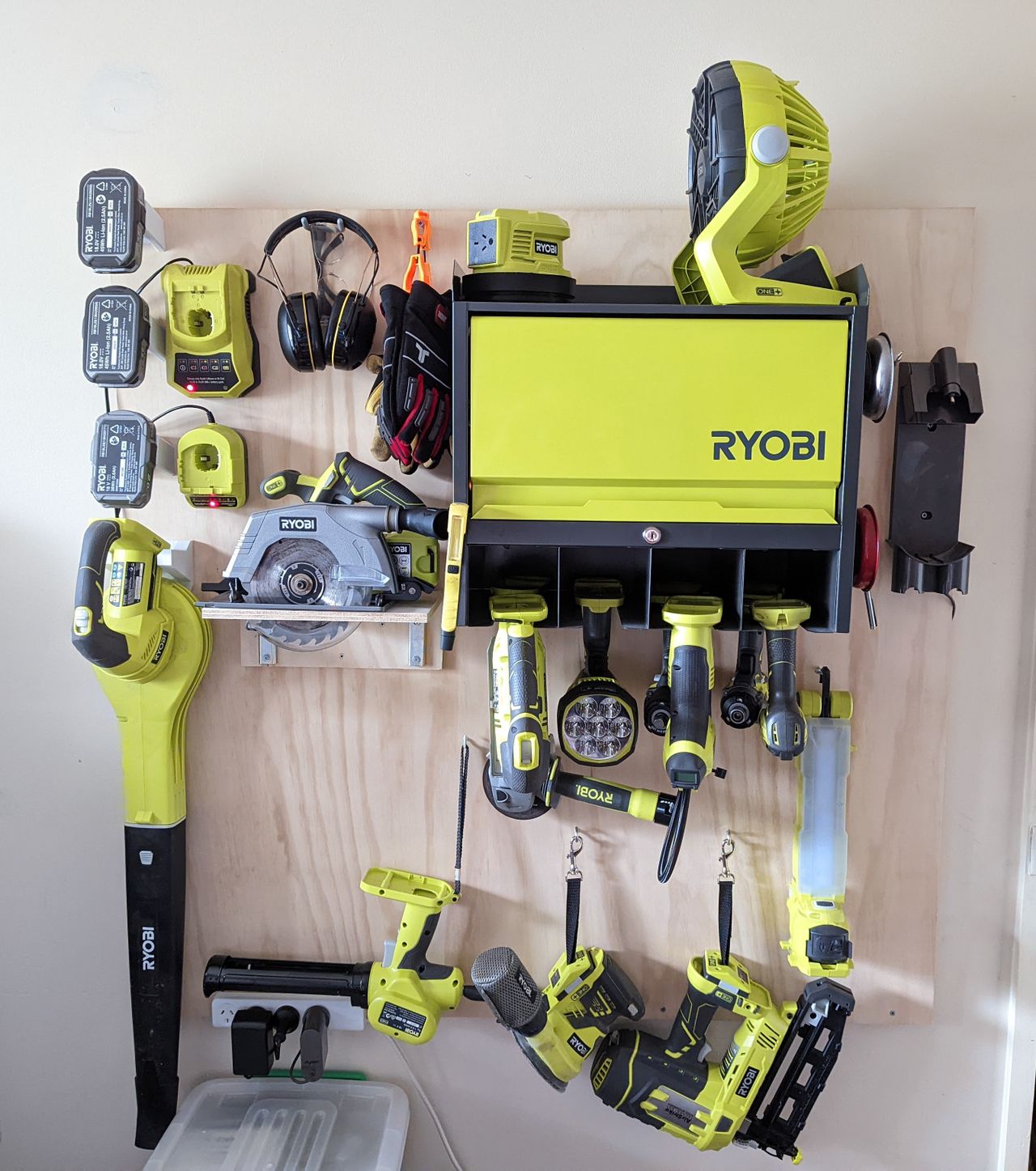 Long overdue project to keep my Ryobi tools in order. Plywood french cleated to the wall so I can easily reorganise as my collection grows.