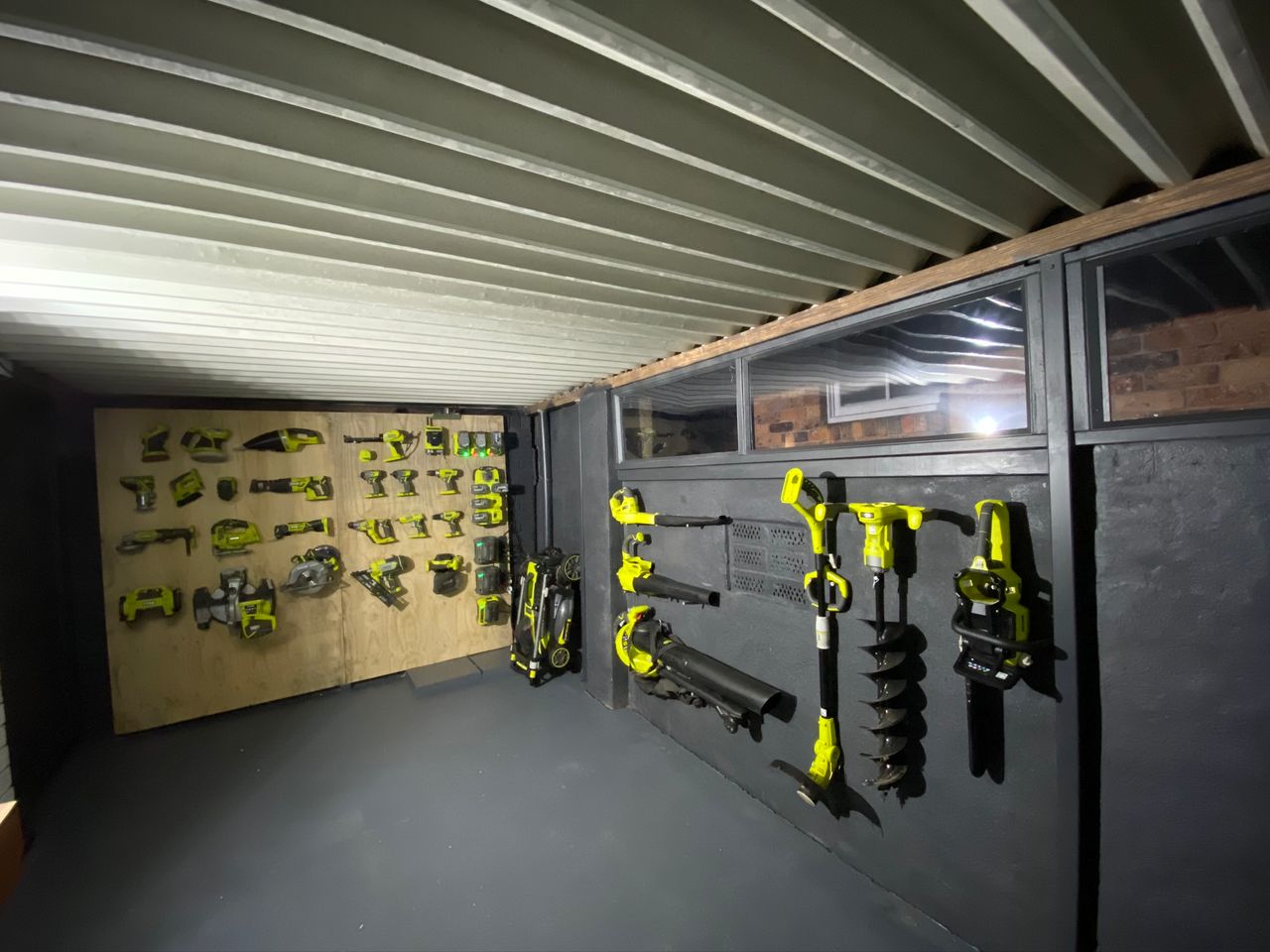 Tool Shed organisation. Created windows in boat port to seal it in and built plywood display wall for power tools.
